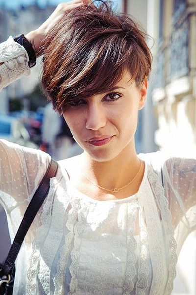 A pixie cut with long bangs